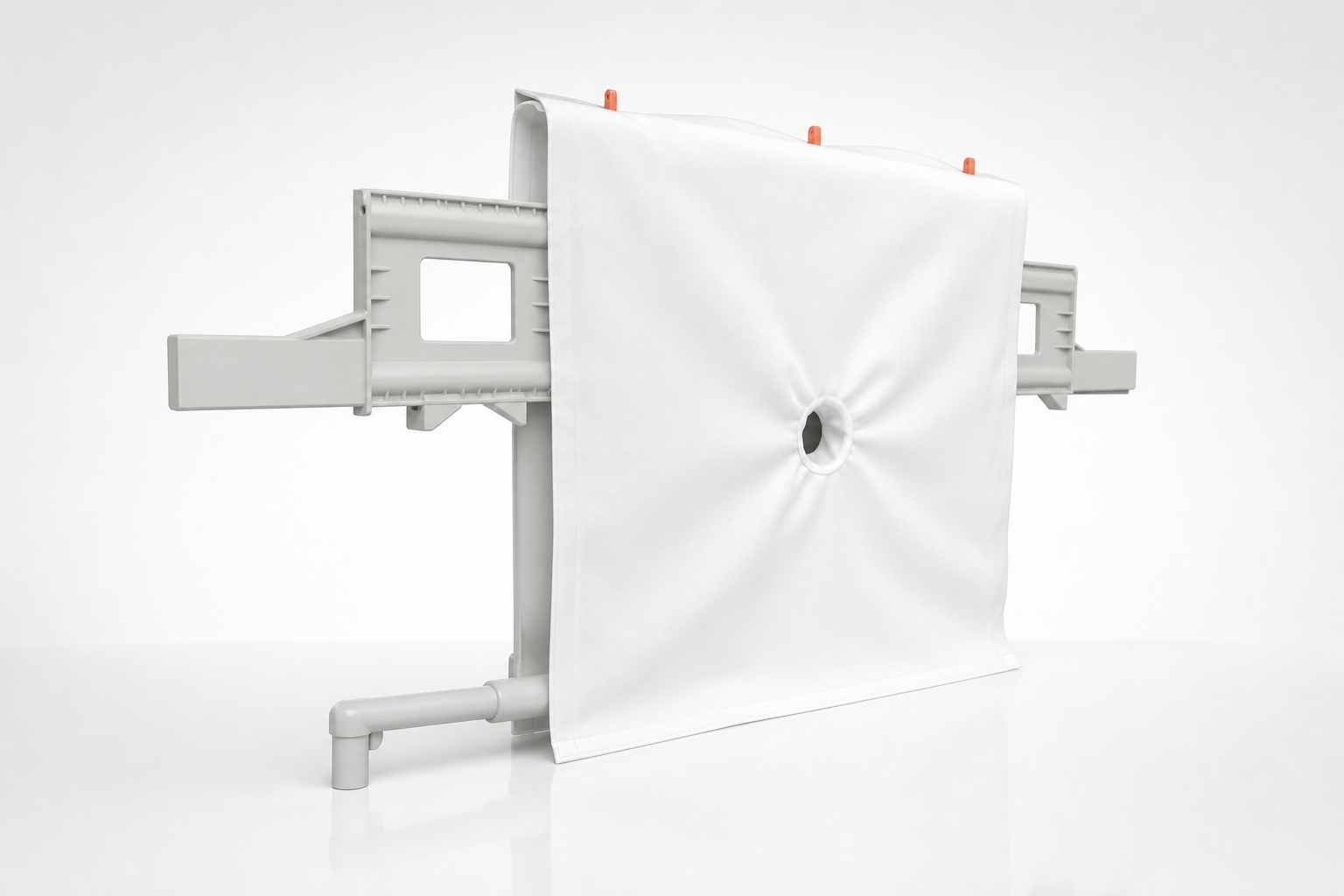 Filter cloth with overhang mounted on a chamber filter press plate